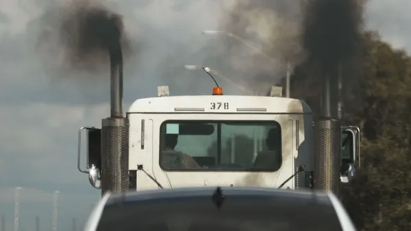 Truck traffic smoke stack emissions