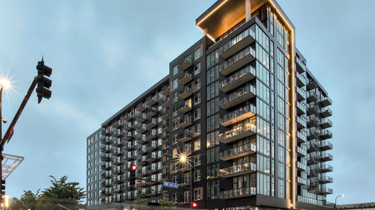 Modern, dark, 10-story apartment building