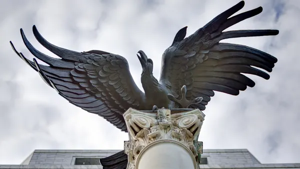 A bronze sculpture of an eagle with a 16-foot wingspan adorns the outside of the Federal Reserve Bank of Atlanta.
