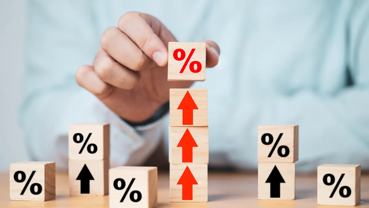 Person putting percentage sign which print screen on wooden cube block.