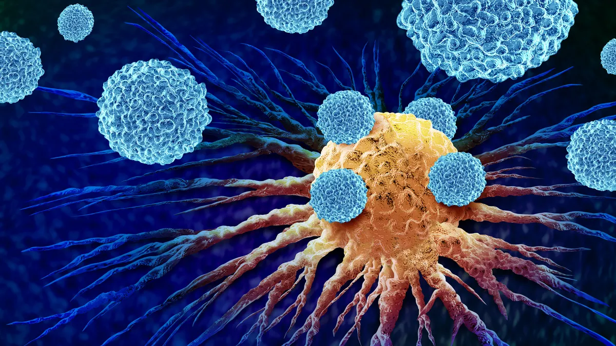 An illustration of leukocytes attacking a cancer cell