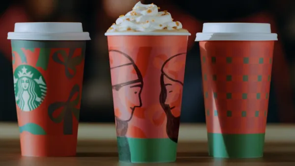 Starbucks holiday cups in an ad