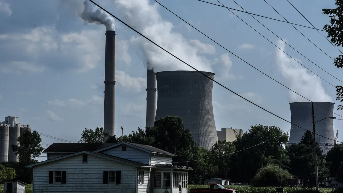 A coal-fired power plant with smokestacks.
