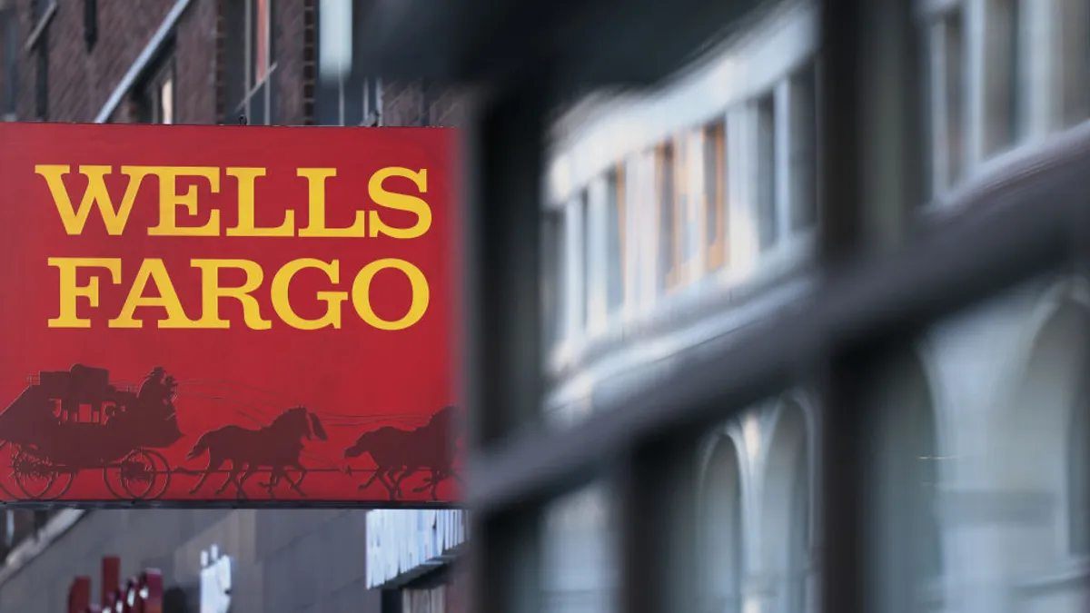 A sign reads "Wells Fargo" with the bank's logo below.