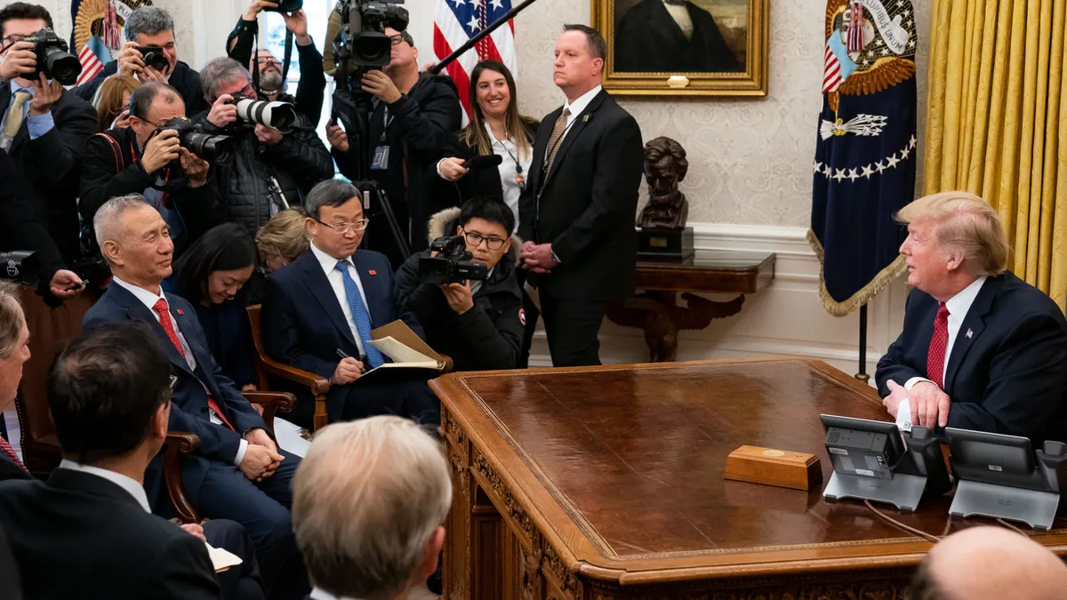 Donald Trump in the oval office at the announcement of the phase one trade deal signing