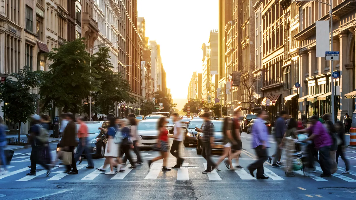 People in a busy crosswalk in Manhattan, New York.