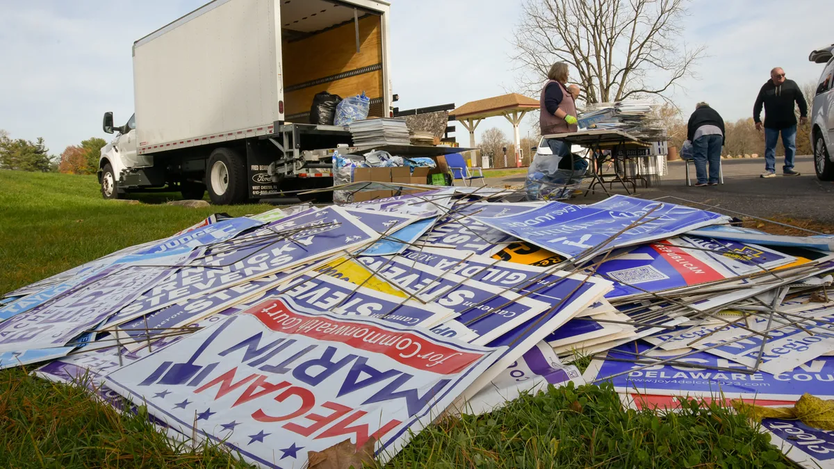 A pile of election materials on the ground, with a truck in the background, in Delaware County, Pennsylvania.