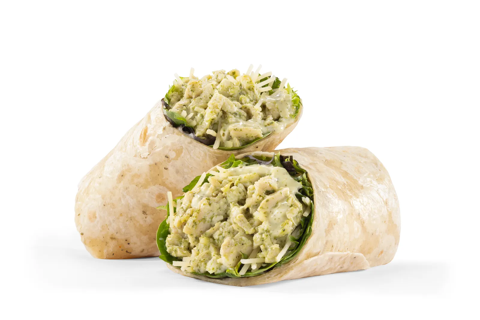 A photo of a chicken wrap with lettuce, parmesan and chicken salad in it against a white background.
