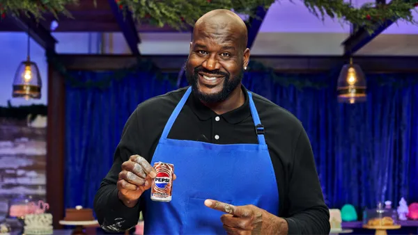 Shaq holds a can of Pepsi Zero Sugar Gingerbread