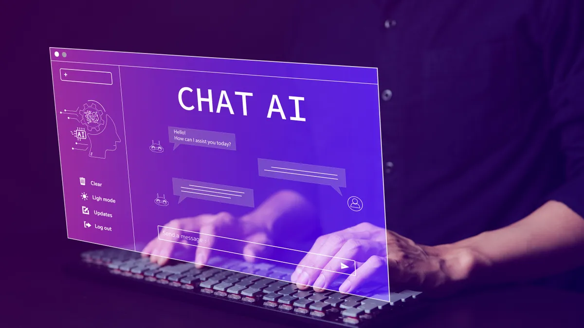 A businessperson uses an AI chatbot on a laptop