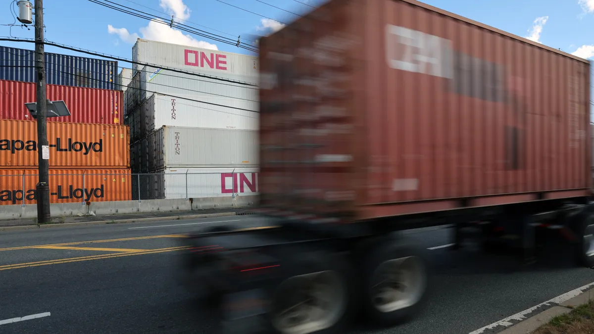 Shipping containers sit stacked in a port on June 09, 2022 in Bayonne, New Jersey.