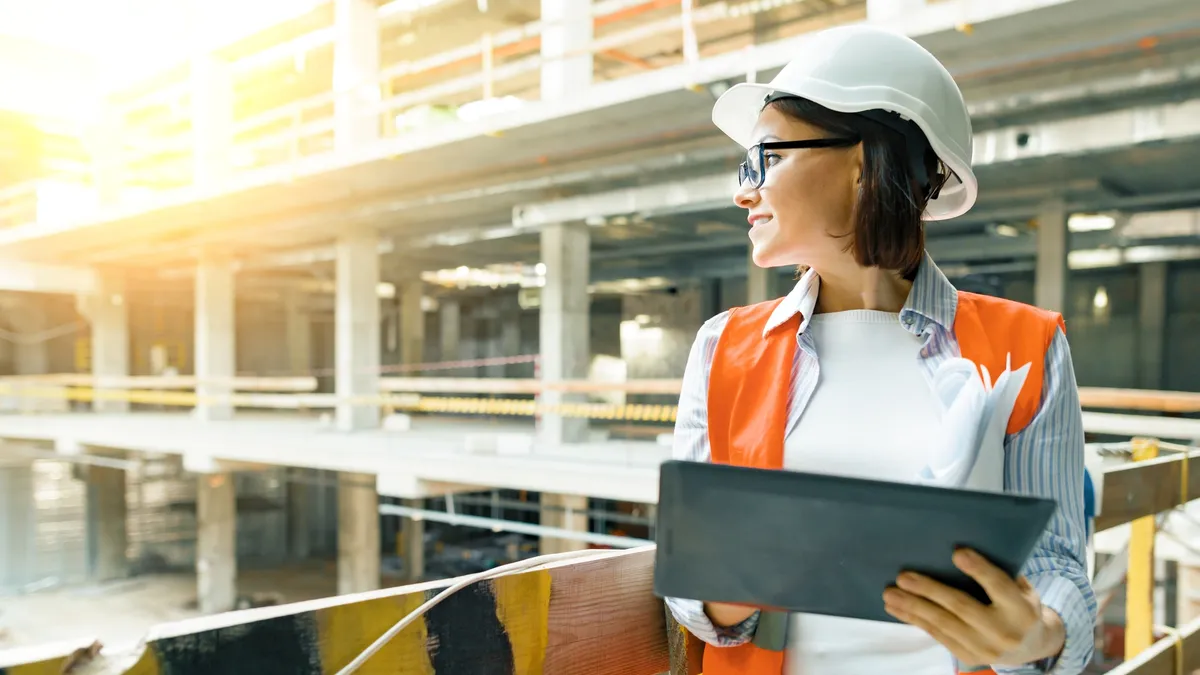 Portrait of female engineer at construction site