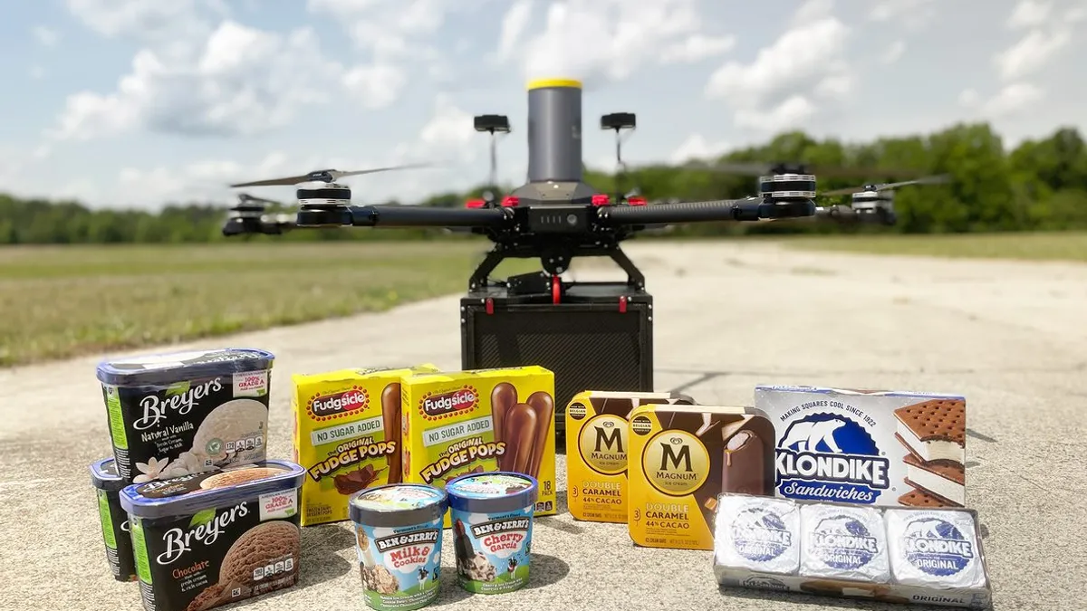 Ice cream from Unilever brands on the ground in front of a Flytrex drone