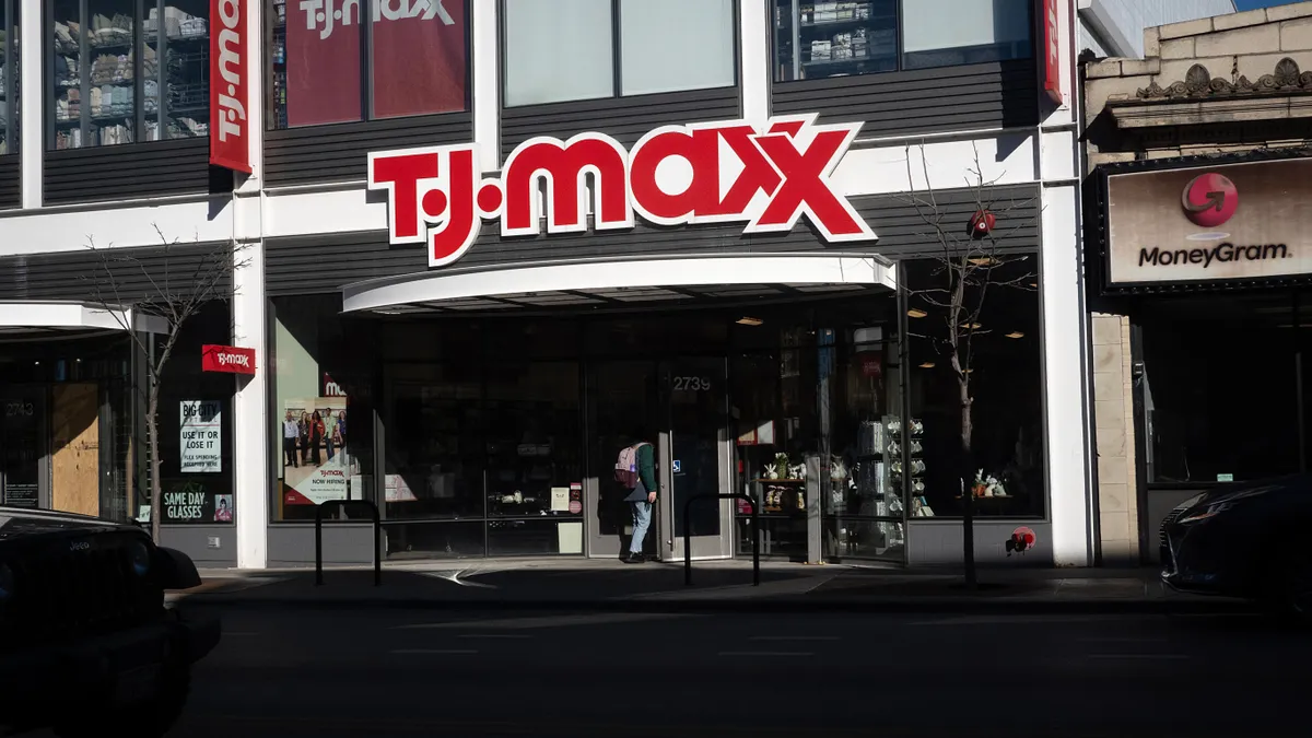 A sign hangs at the entrance of a T.J. Maxx store on February 28, 2024 in Chicago, Illinois.