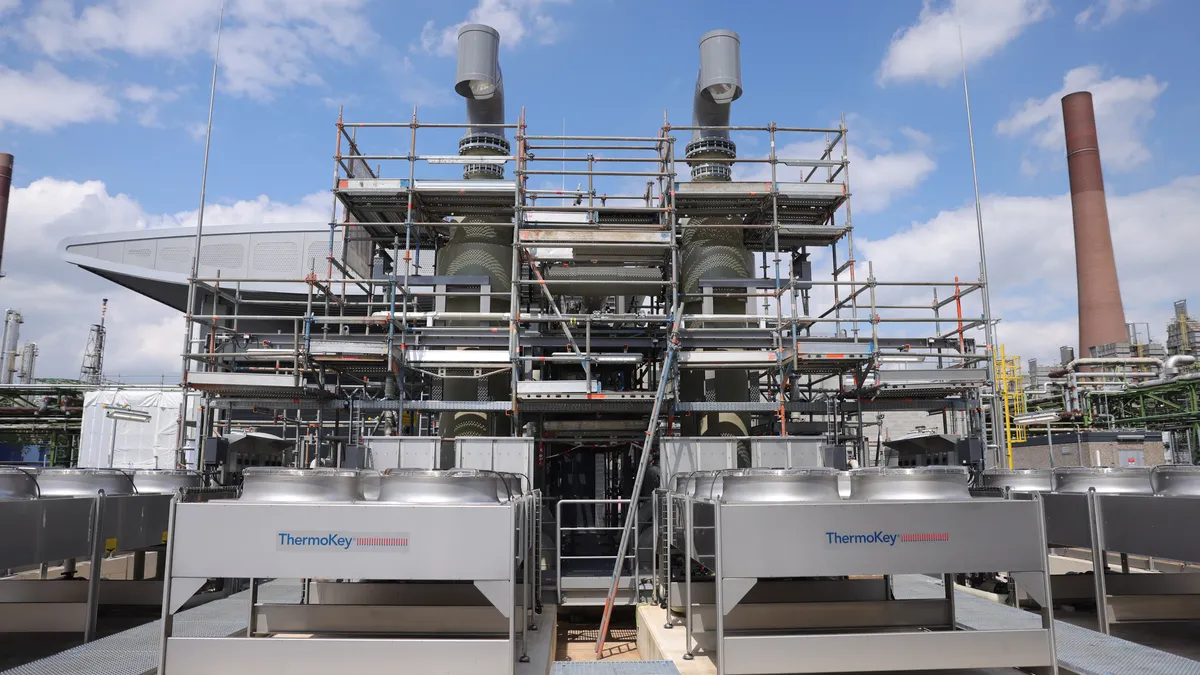 A view of the front of a hydrogen production plant on on a sunny day.