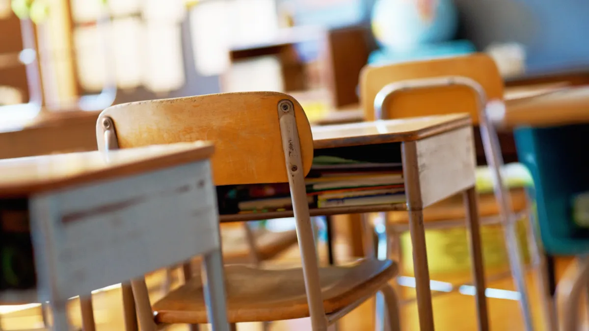 Classroom with wooden desks.