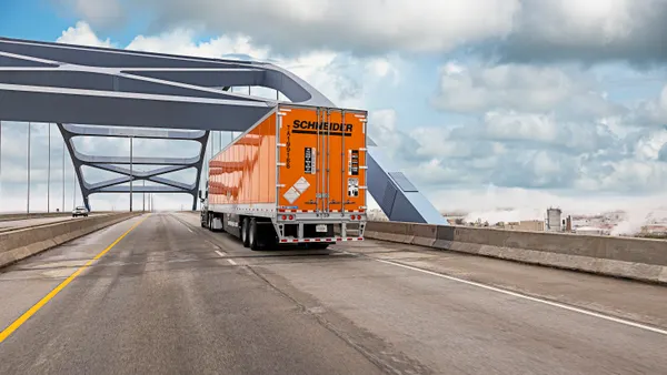 Schneider National truck on bridge