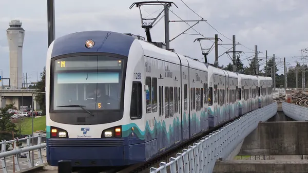 A train approaches the station.