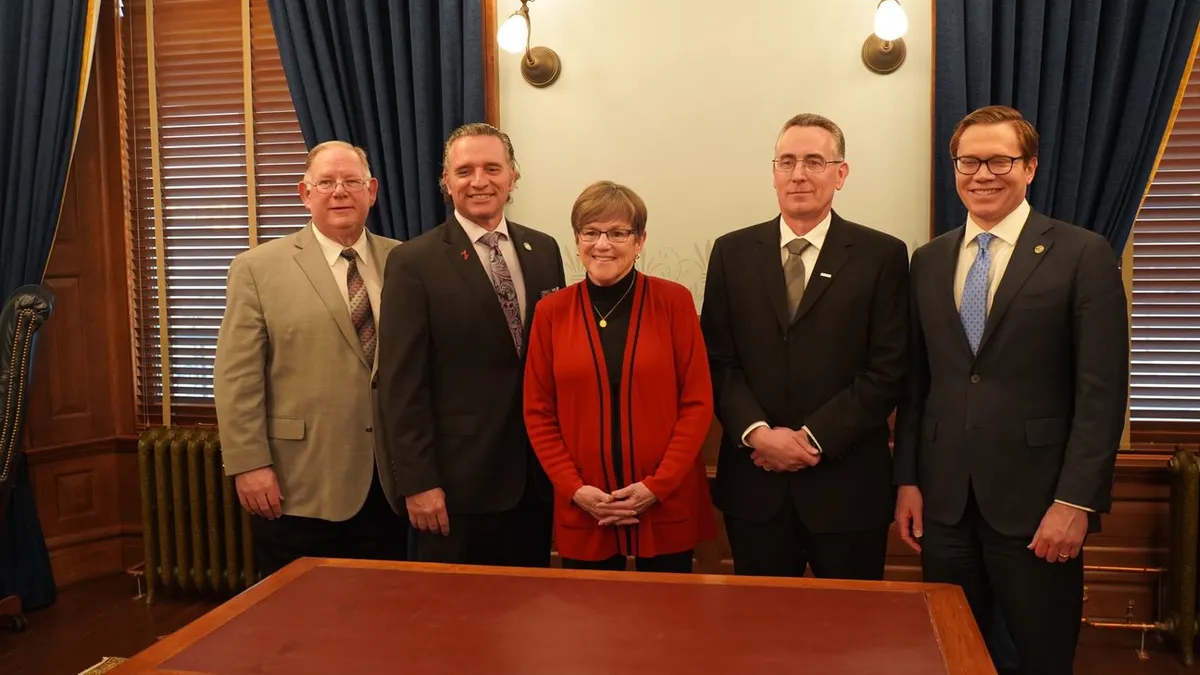 From left to right: Kansas Speaker of the House Dan Hawkins, Kansas Senate President Senator Ty Masterson, Kansas Governor Laura Kelly, Integra Technologies President and CEO Brett Robinson