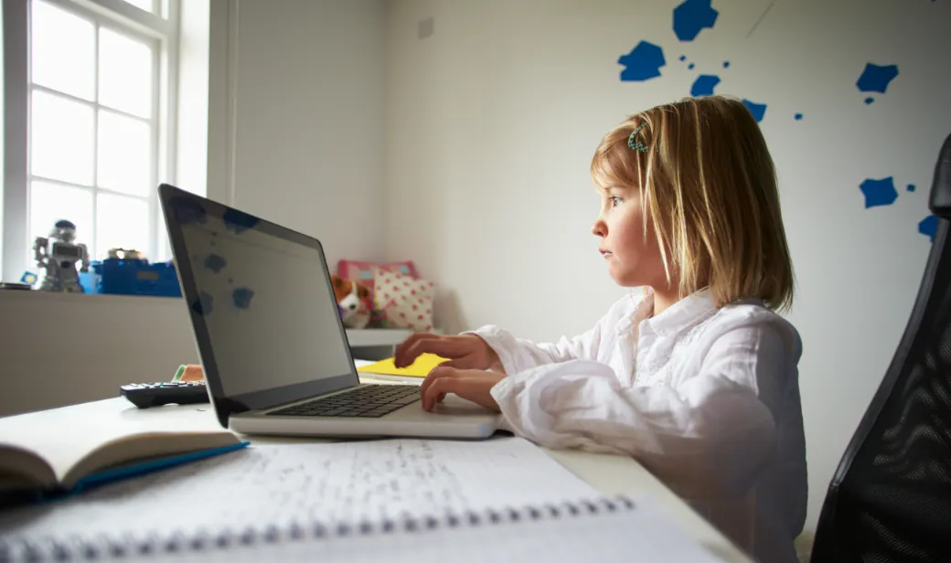 Child using laptop