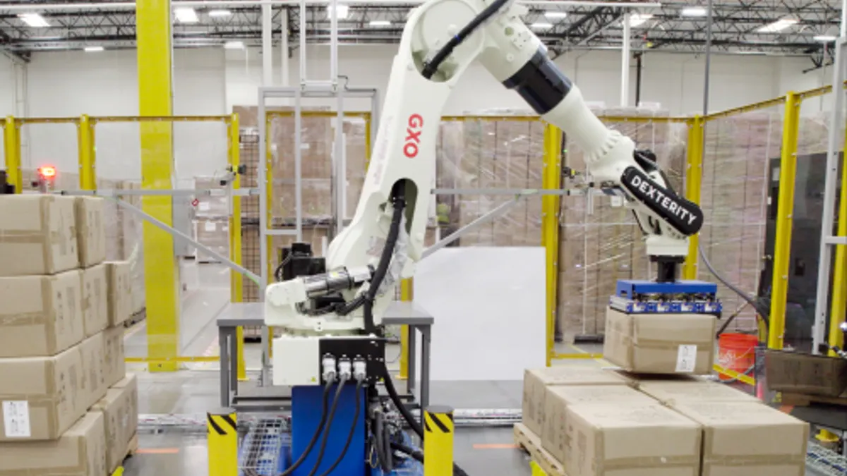 A Dexterity-powered robot picks through products at a GXO warehouse.