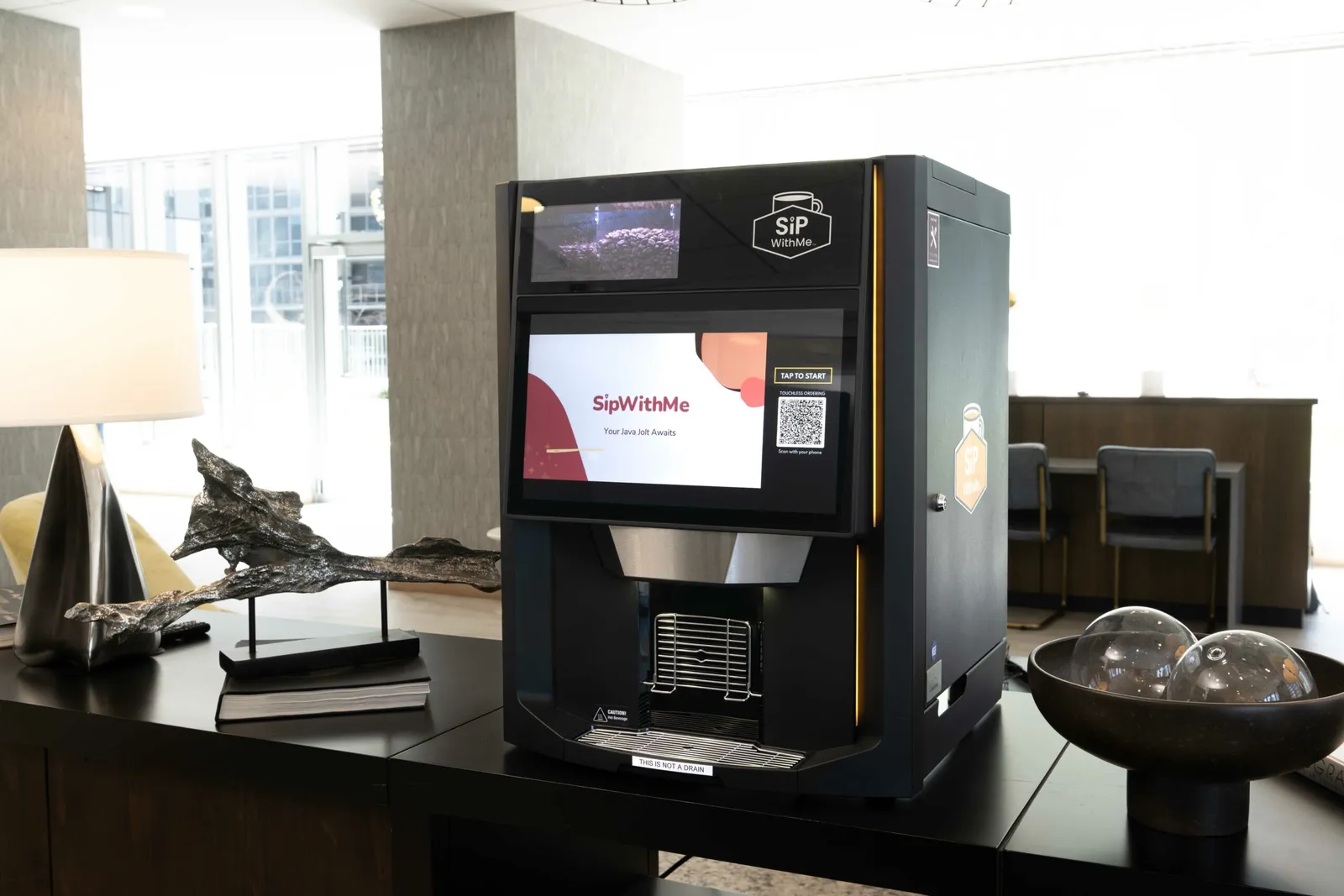 A coffee machine in a room.