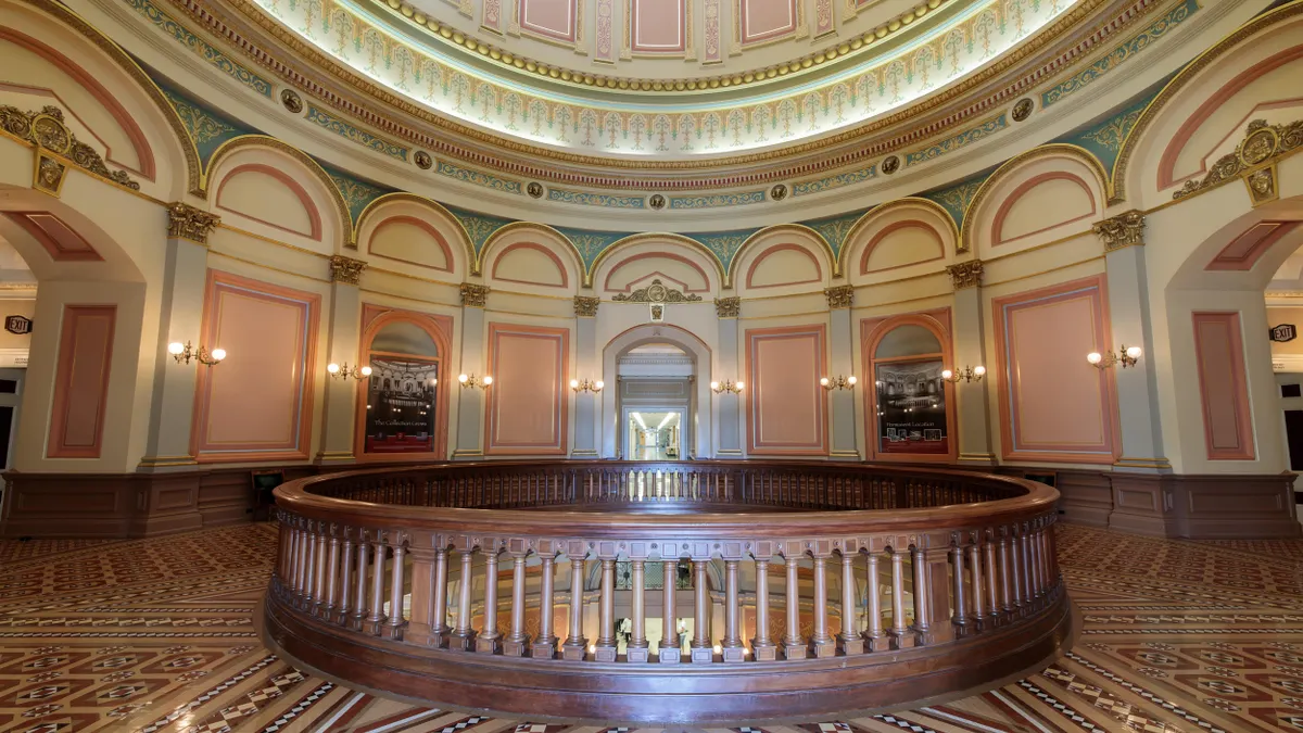 The Capitol's second-floor Rotunda is a geometric mosaic of earth-toned shapes, creating a "marquetry" effect similar to the inlaid woodwork in Renaissance Revival furniture.