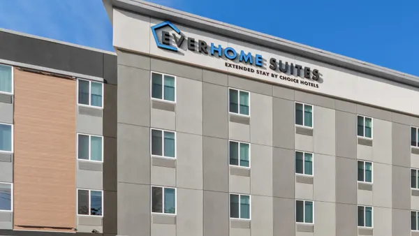 The exterior of an Everhome Suites hotel.