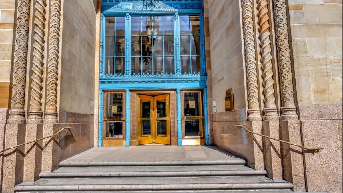 An exterior shot of an entryway to the Courtyard San Diego Downtown.