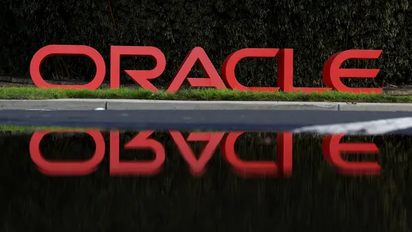 A sign is posted in front of Oracle headquarters on March 11, 2024 in Redwood Shores, California