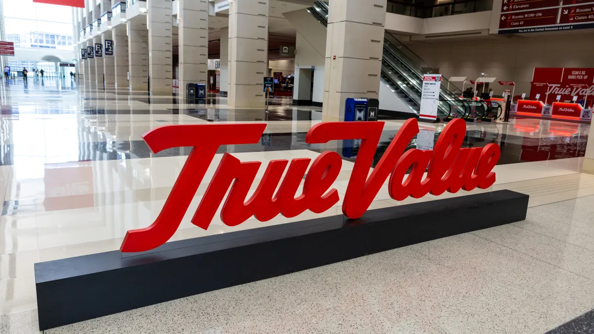 The True Value logo is displayed at a trade show in Chicago.