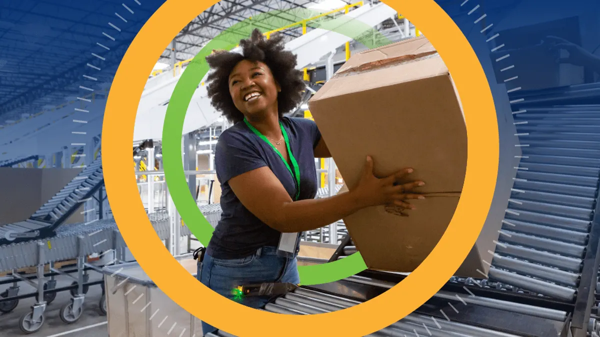 Woman sorting packages in a warehouse.