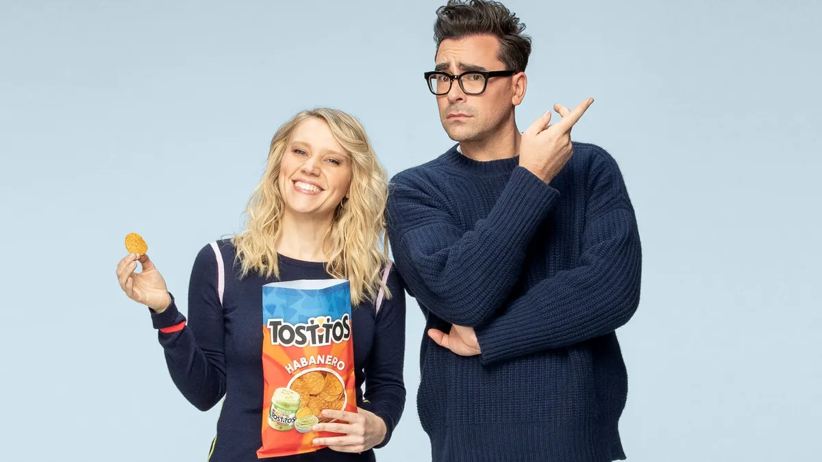 Actors Kate McKinnon and Dan Levy for Tostitos' “For the Love of Chips and Dip” campaign last year.