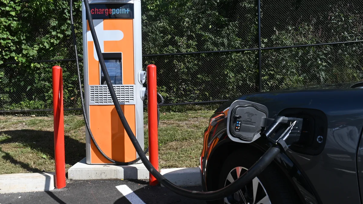 A photo of a ChargePoint EV charger outside an XtraMart convenience store, taken at a ribbon cutting for the charger on Sept. 19, 2023.