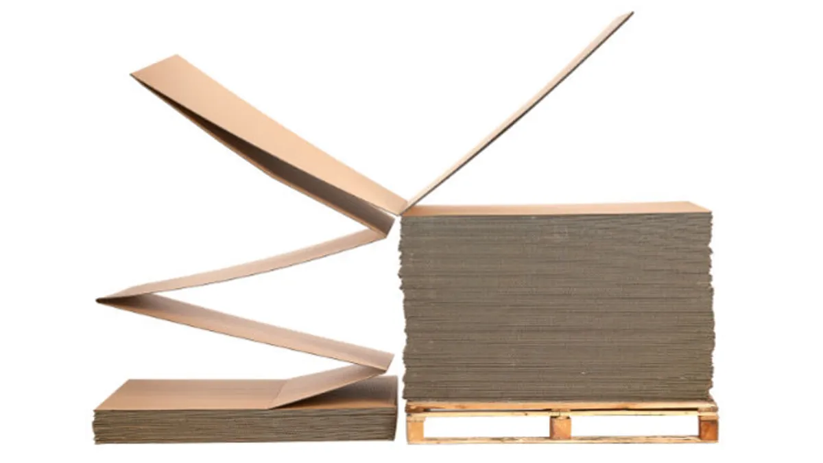 A stack of corrugated "fanfold," or accordion-folded box material.