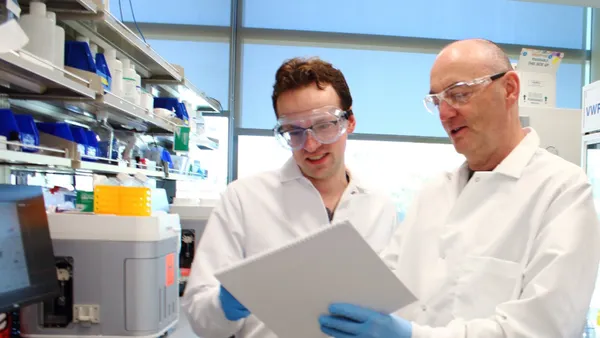 A pair of scientists work in Electra Therapeutics' lab.