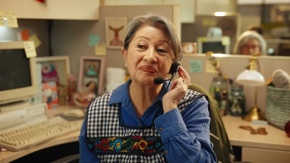 An abuela works at a call center in a Del Real Foods campaign