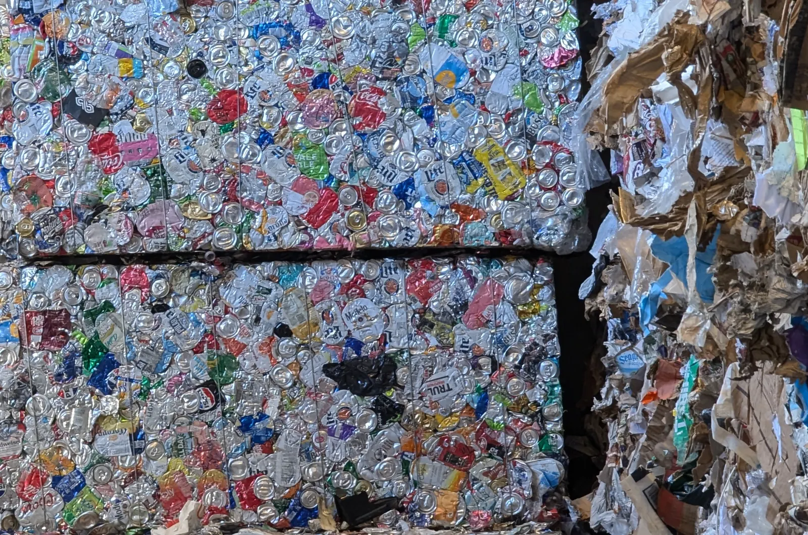 Close up of a bale of aluminum cans, crushed after sorting in a recycling facility