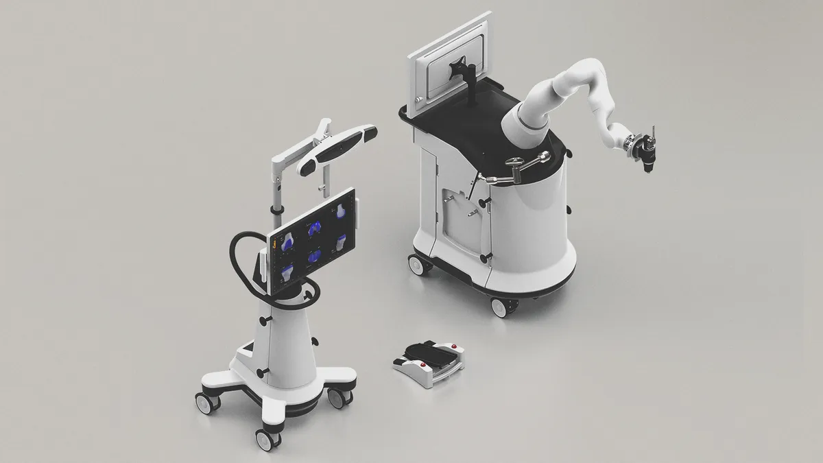 Monogram Technologies' robotic surgery system is displayed against a gray background.