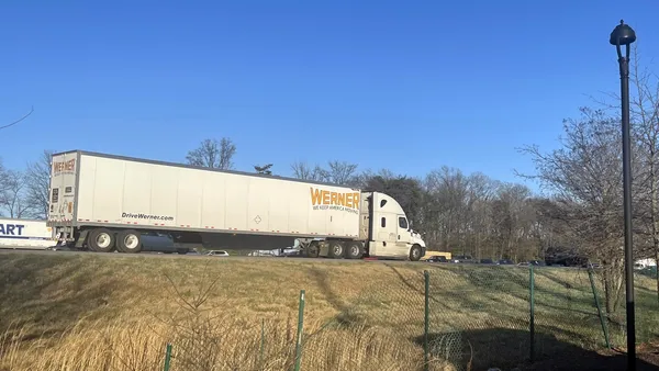 A Werner trailer is hauled on an interestate.