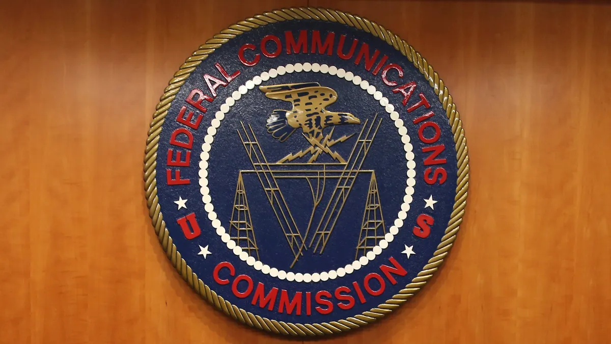 The seal of the Federal Communications Commission.