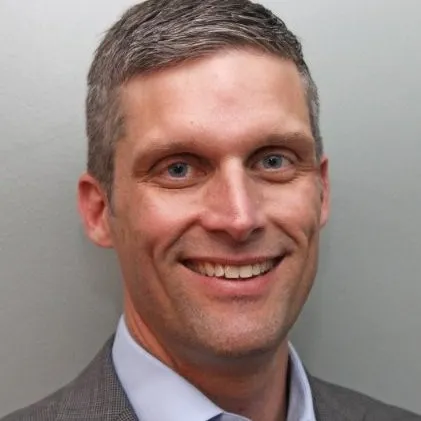 A headshot of Sean Kennedy.