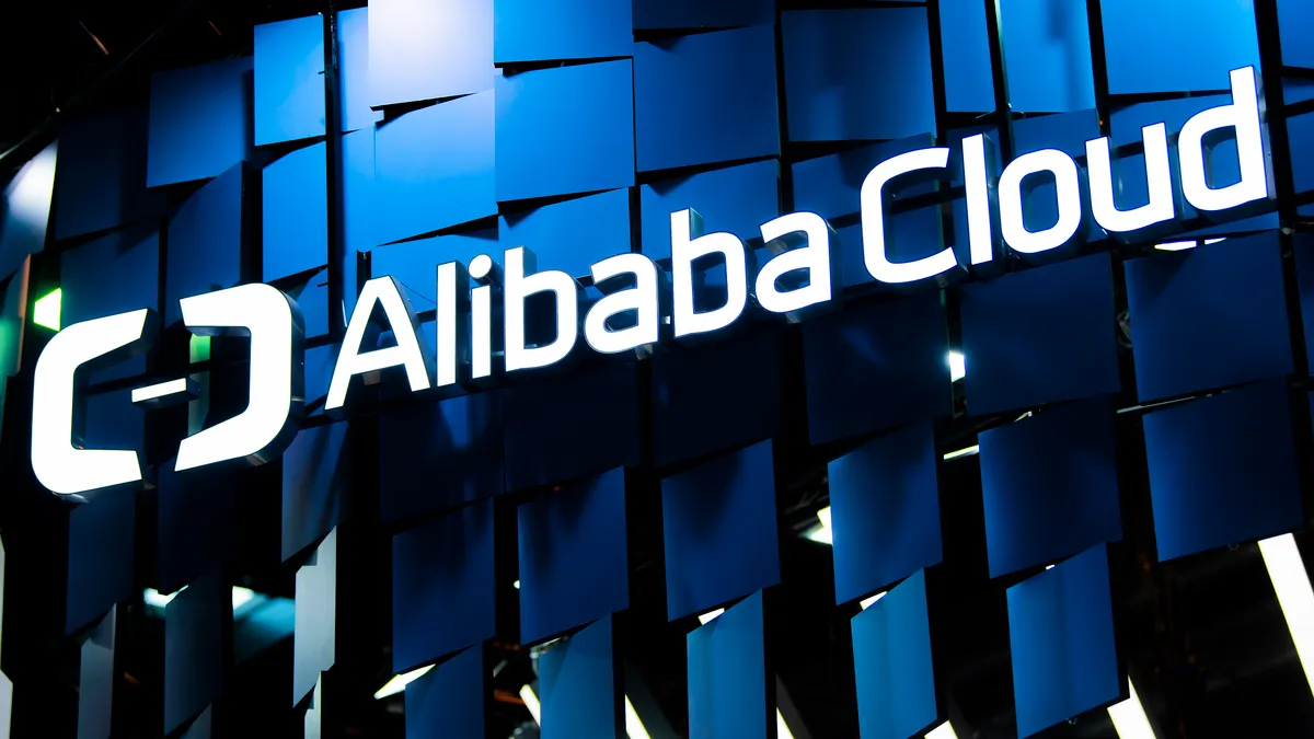 A logo sits illumintated outside the Alibaba Cloud booth on day 2 of the GSMA Mobile World Congress 2019 on February 26, 2019 in Barcelona, Spain.