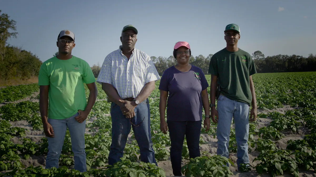 Pictured in the photo are Steve Singleton (second from left), wife April and sons, in which selling potatoes is a multi-generation family business.