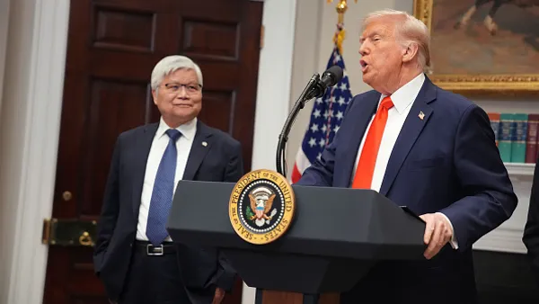 U.S. President Donald Trump (R) speaks alongside Taiwan Semiconductor Manufacturing Co. CEO C.C. Wei at the White House on March 3.