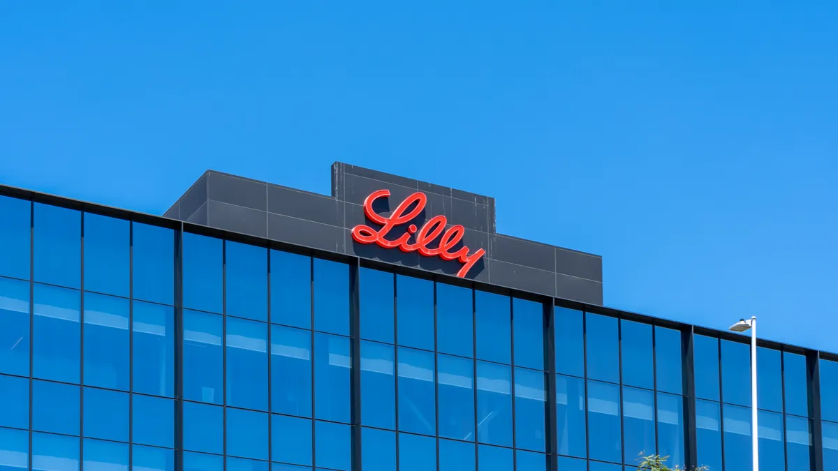 An Eli Lilly logo is seen at the top of a building.