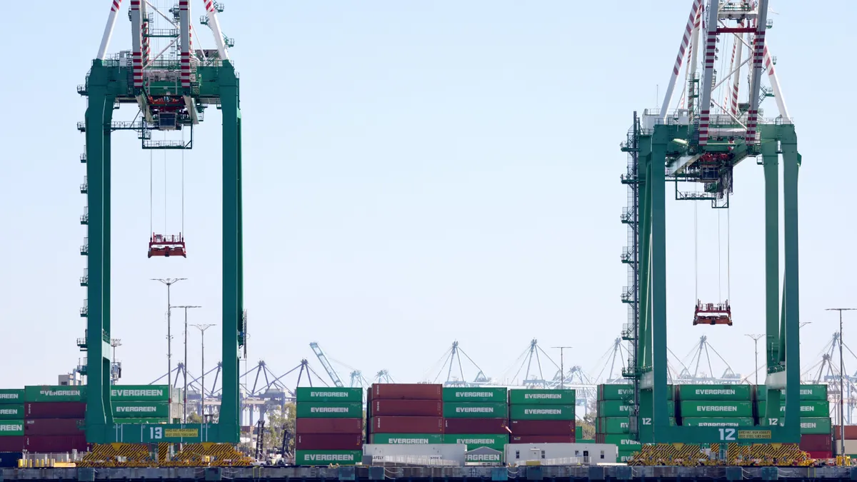 Container cranes at an ocean port.