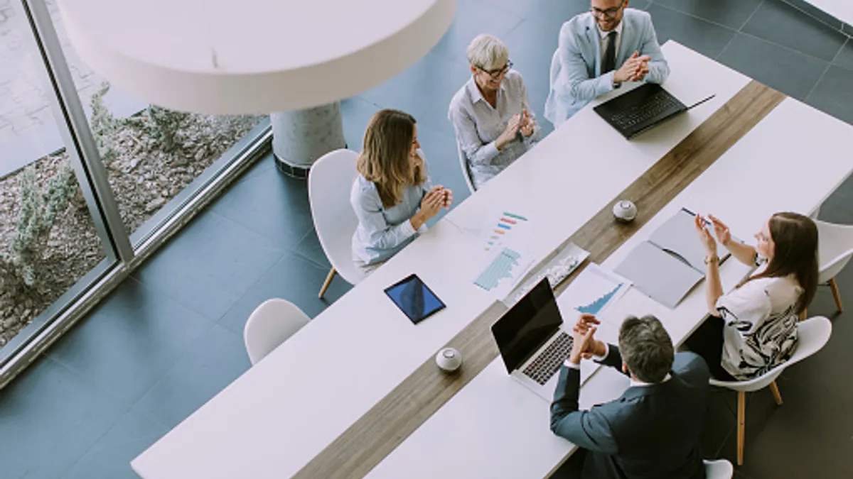 Aerial view of a group of business people meeting in office