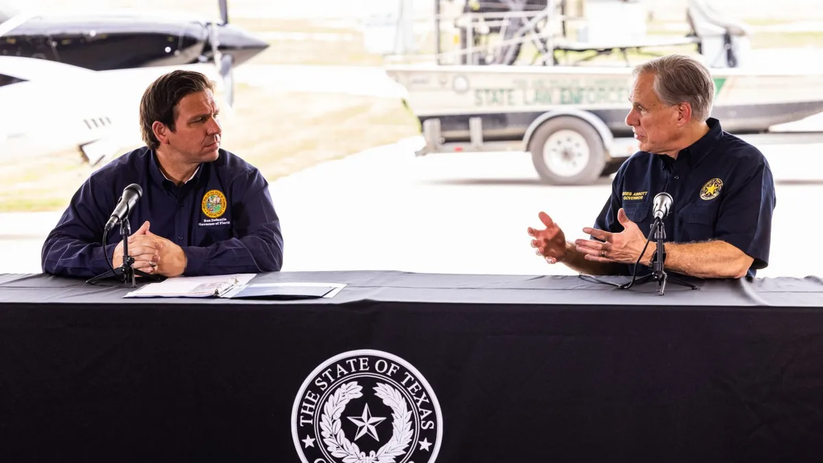 Governor of Texas holds a meeting with the governor of Floroida.