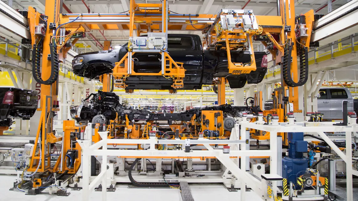 A light-duty truck is manufactured on an assembly line